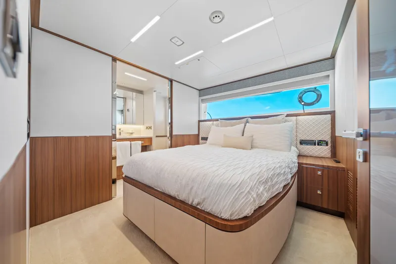 Rio Yacht Photos Pics Luxurious bedroom interior on 2023 Horizon FD90 yacht with modern design and ocean view.