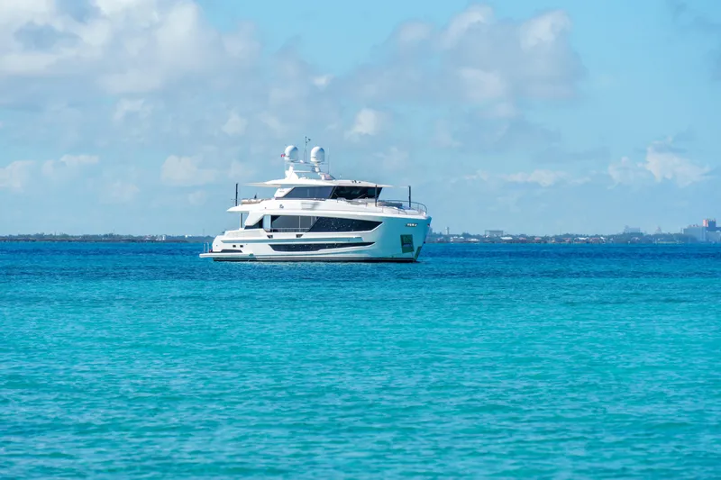 Rio Yacht Photos Pics Luxury Horizon FD90 yacht on clear blue ocean, 2023 model.