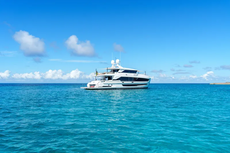 Rio Yacht Photos Pics Luxury Horizon FD90 yacht on clear blue ocean, 2023 model.