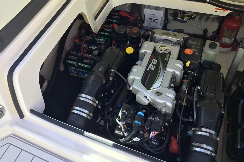 Enbarr Yacht Photos Pics Engine compartment of a 2017 Regal 3200 Bowrider, featuring a powerful marine engine.