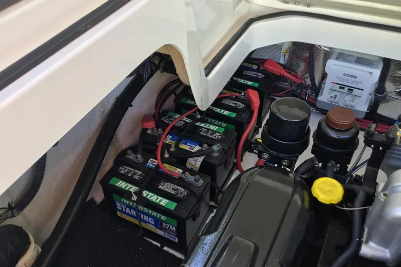 Enbarr Yacht Photos Pics Engine compartment of 2017 Regal 3200 Bowrider with Interstate batteries and ProMariner charger.