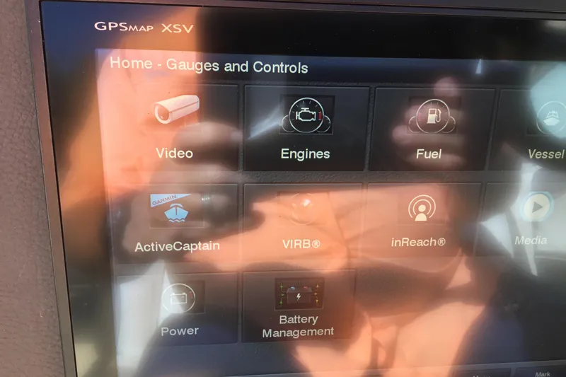 Enbarr Yacht Photos Pics Touchscreen display of a 2017 Regal 3200 Bowrider showing gauges and controls interface.