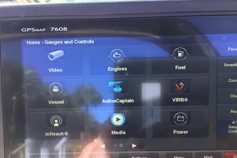 Enbarr Yacht Photos Pics Touchscreen display of GPSMAP 7608 on 2017 Regal 3200 Bowrider, showing gauges and controls.