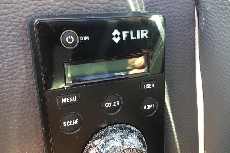 Enbarr Yacht Photos Pics Control panel of a 2017 Regal 3200 Bowrider featuring FLIR system buttons.