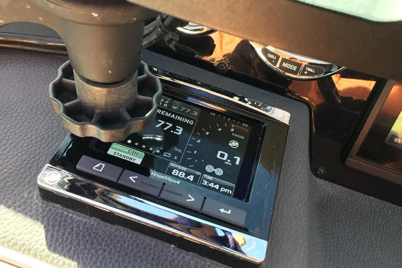 Enbarr Yacht Photos Pics Close-up of 2017 Regal 3200 Bowrider dashboard with digital display and controls.