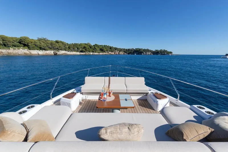  Yacht Photos Pics Luxurious Azimut Fly 62 yacht deck with seating, ocean view, and clear blue sky, 2025 model.