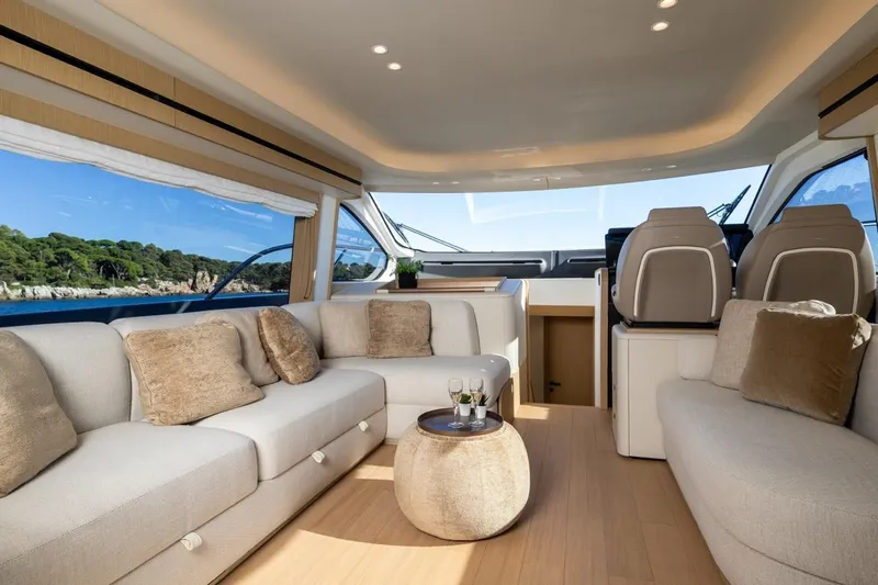  Yacht Photos Pics Luxurious interior of 2025 Azimut Fly 62 yacht with elegant seating and scenic views.