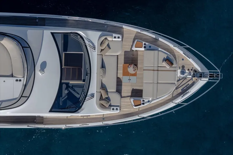  Yacht Photos Pics Top view of 2025 Azimut Fly 62 yacht with luxurious deck seating.