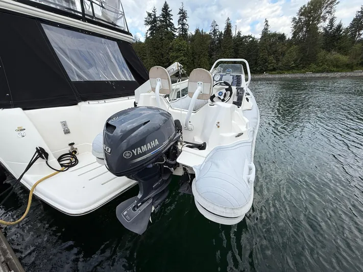 Diamonds Wild Yacht Photos Pics 2006 Meridian 411 Sedan with Yamaha outboard motor docked on calm water.