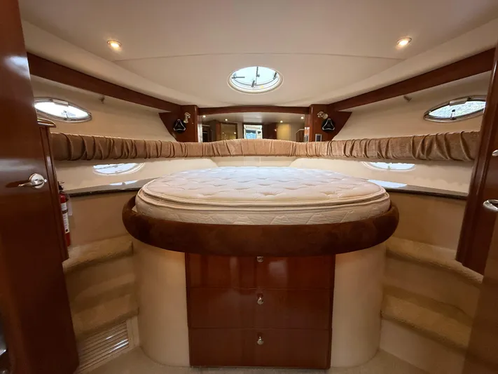 Diamonds Wild Yacht Photos Pics Luxurious interior of a 2006 Meridian 411 Sedan yacht with a cozy bed.