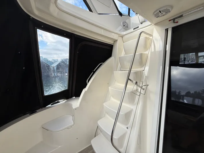 Diamonds Wild Yacht Photos Pics Interior of 2006 Meridian 411 Sedan yacht with stairs and window view.