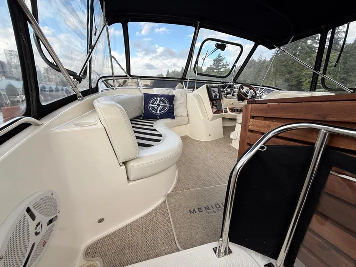 Diamonds Wild Yacht Photos Pics 2006 Meridian 411 Sedan interior with plush seating and nautical decor.