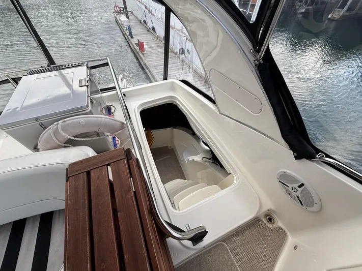 Diamonds Wild Yacht Photos Pics 2006 Meridian 411 Sedan yacht interior with seating, life preserver, and water view.