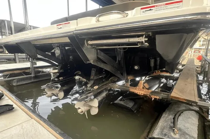  Yacht Photos Pics 2023 Sea Ray SLX 400 boat propellers and stern view in marina.