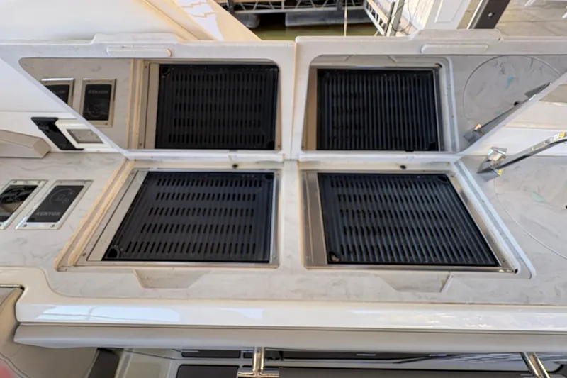  Yacht Photos Pics Outdoor grill station on 2023 Sea Ray SLX 400 yacht, featuring dual grills and sleek design.