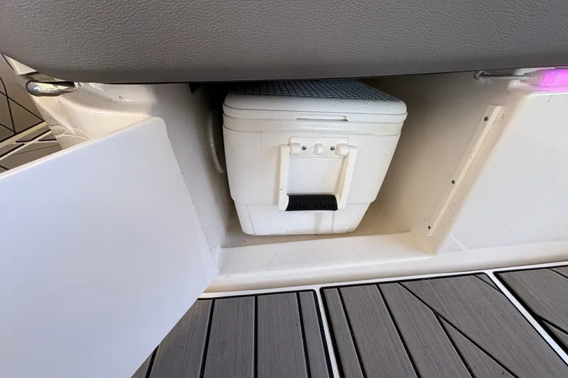  Yacht Photos Pics Storage compartment with cooler on 2023 Sea Ray SLX 400 boat deck.