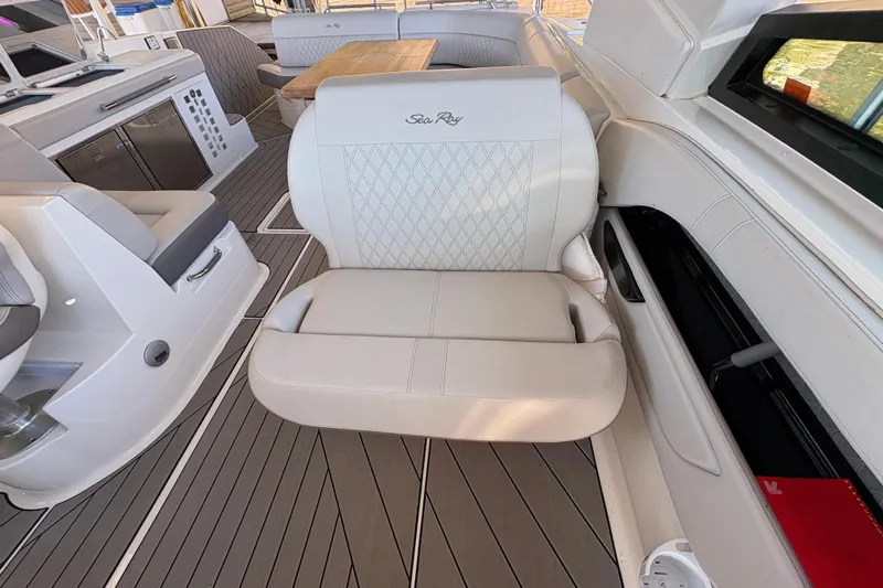  Yacht Photos Pics Luxurious interior of 2023 Sea Ray SLX 400 boat with elegant seating and modern amenities.