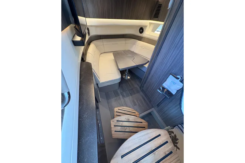  Yacht Photos Pics Luxurious interior of 2023 Sea Ray SLX 400 boat with elegant seating and modern design.