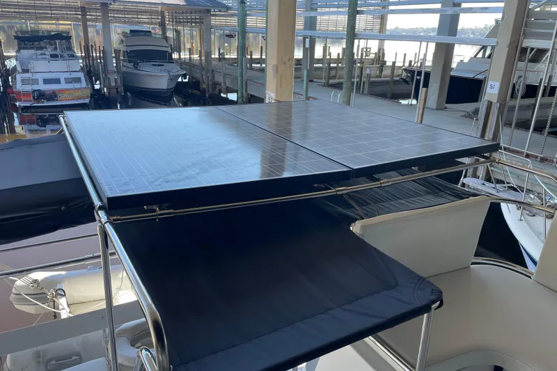 "new Hope" Yacht Photos Pics Solar panels on a 2006 PDQ 34 Power Catamaran in a marina.