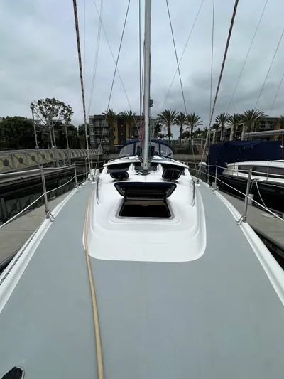 Lanikai Yacht Photos Pics 2007 Hunter 44 Deck Salon sailboat docked, showcasing sleek deck design and modern features.