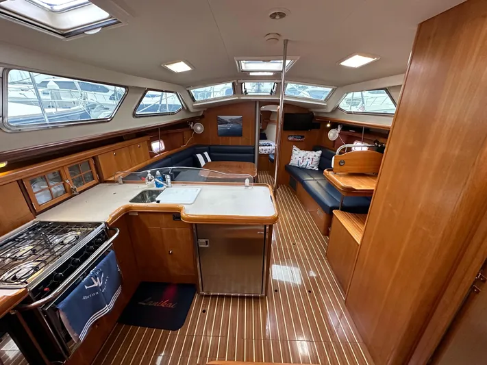 Lanikai Yacht Photos Pics Interior of 2007 Hunter 44 Deck Salon yacht with spacious kitchen and seating area.