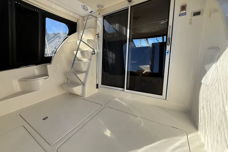 Yacht Photos Pics 2007 Meridian 411 Sedan interior with stairs and sliding glass door.