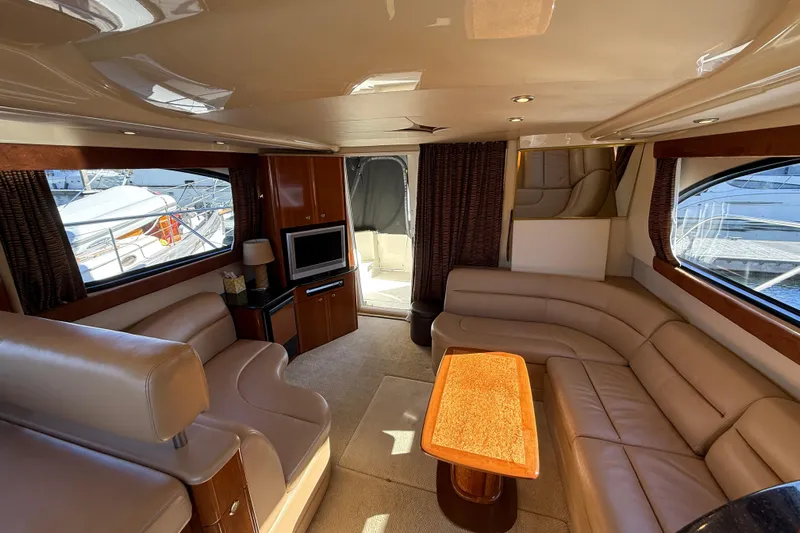  Yacht Photos Pics Luxurious interior of a 2007 Meridian 411 Sedan yacht with plush seating and elegant decor.