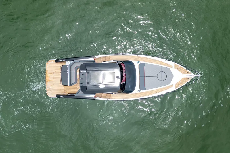  Yacht Photos Pics Aerial view of 2026 GRAND OCEAN 37 yacht on green water.