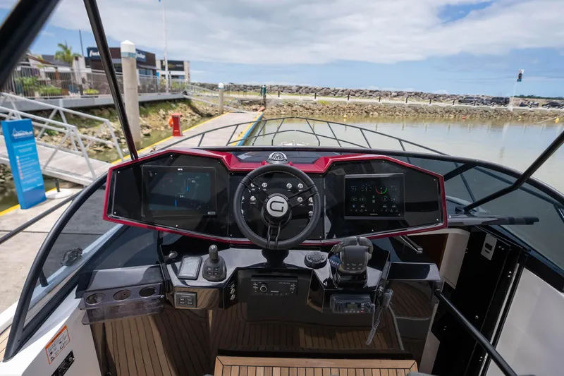  Yacht Photos Pics Cockpit of 2026 GRAND OCEAN 37 boat with modern controls and navigation screens.