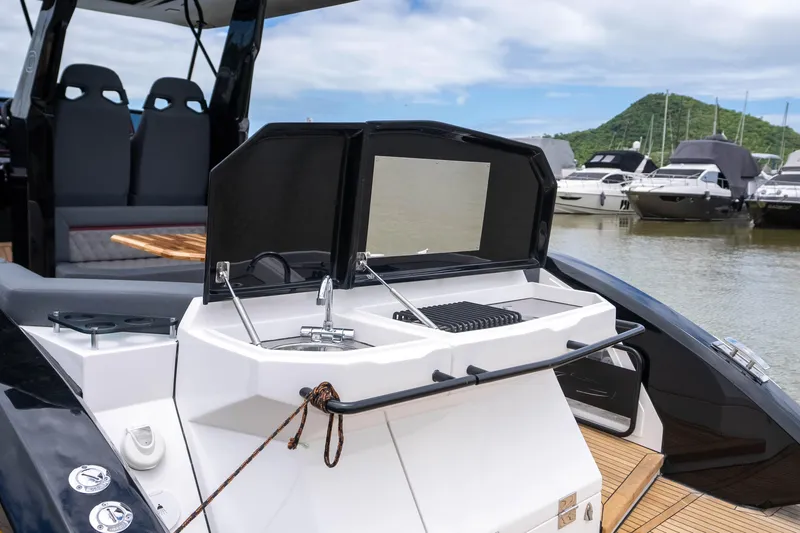  Yacht Photos Pics Luxury GRAND OCEAN 37 yacht with modern amenities, docked in a scenic marina, 2026 model.