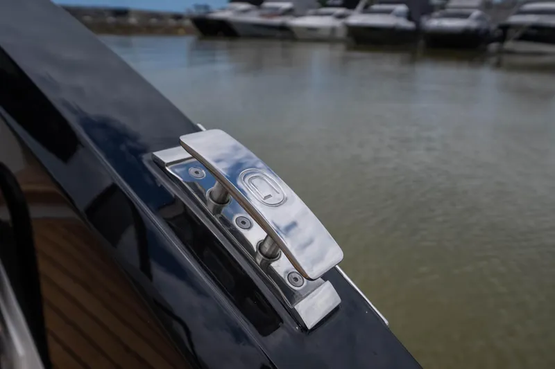  Yacht Photos Pics Sleek chrome cleat on GRAND OCEAN 37 yacht, 2026 model, docked by the water.
