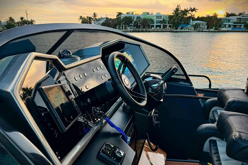  Yacht Photos Pics Luxury GRAND OCEAN 37 yacht cockpit with modern controls, 2026 model, at sunset.
