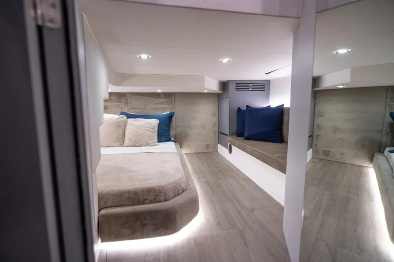  Yacht Photos Pics Luxurious interior of 2026 GRAND OCEAN 37 yacht with cozy bed and modern lighting.