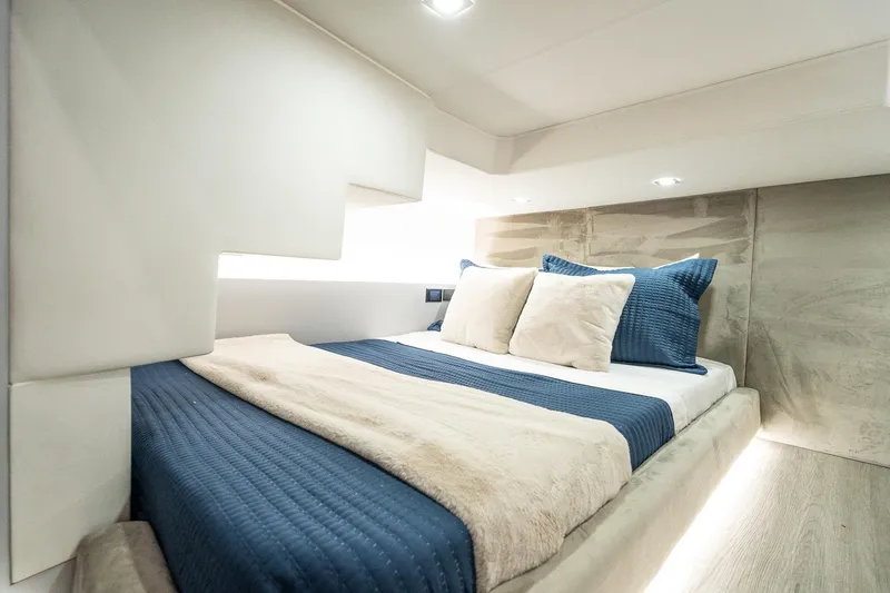  Yacht Photos Pics Luxurious bedroom interior of 2026 GRAND OCEAN 37 yacht with modern design.
