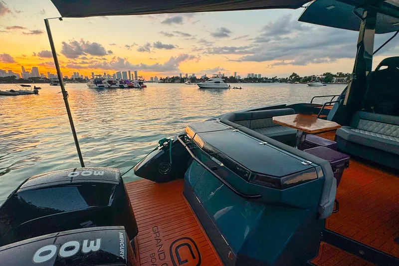  Yacht Photos Pics Luxury GRAND OCEAN 37 yacht at sunset, 2026 model, with scenic waterfront view.