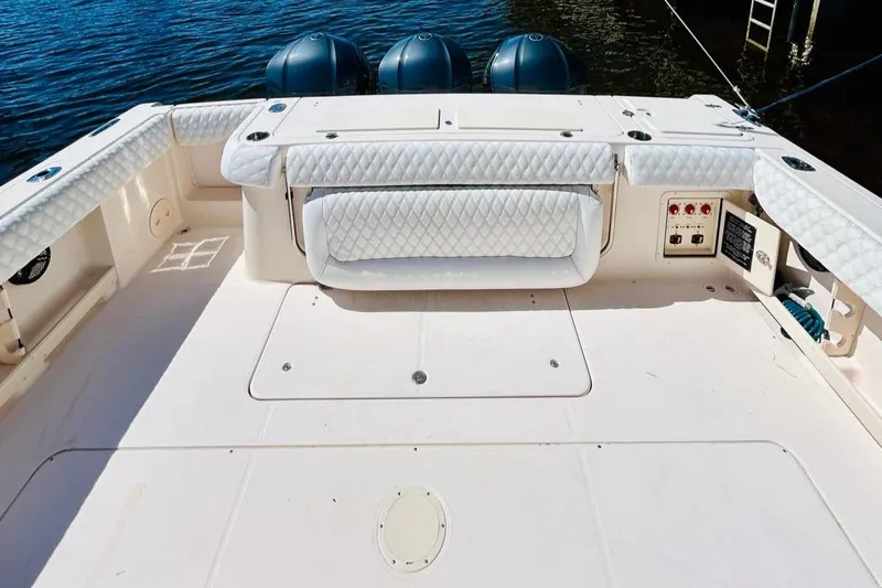 The Office Yacht Photos Pics 2012 Grady-White Canyon 366 boat deck with triple outboard engines.
