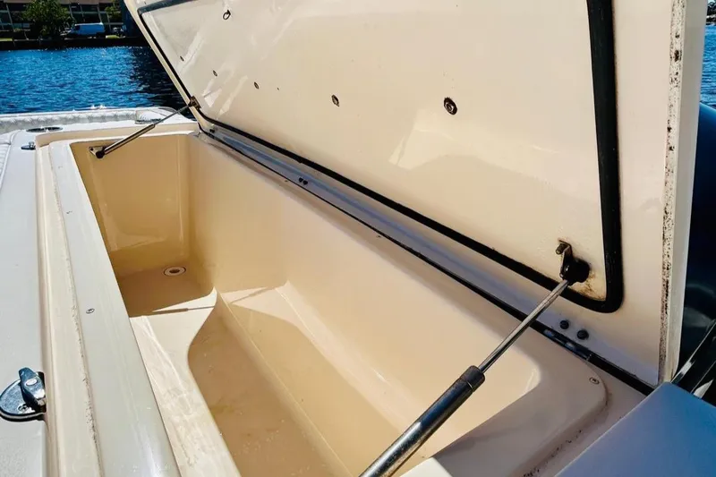 The Office Yacht Photos Pics 2012 Grady-White Canyon 366 storage compartment open by the water.