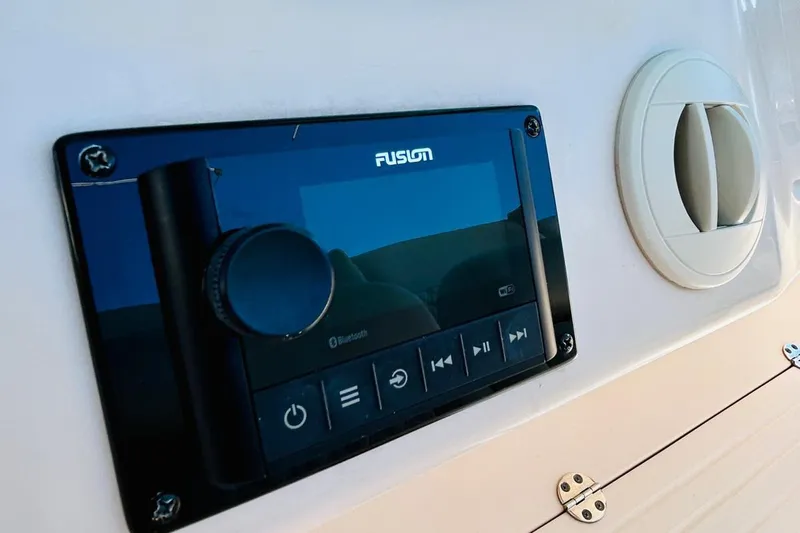 The Office Yacht Photos Pics Fusion audio system on 2012 Grady-White Canyon 366 boat dashboard.
