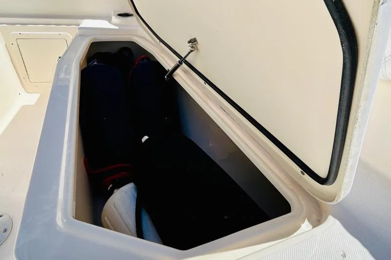 The Office Yacht Photos Pics Open storage compartment on 2012 Grady-White Canyon 366 boat.