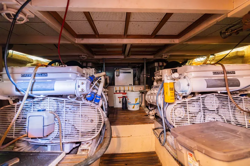 Cheers Yacht Photos Pics Engine room of 1989 Grand Banks 46 Classic yacht with dual Caterpillar engines.