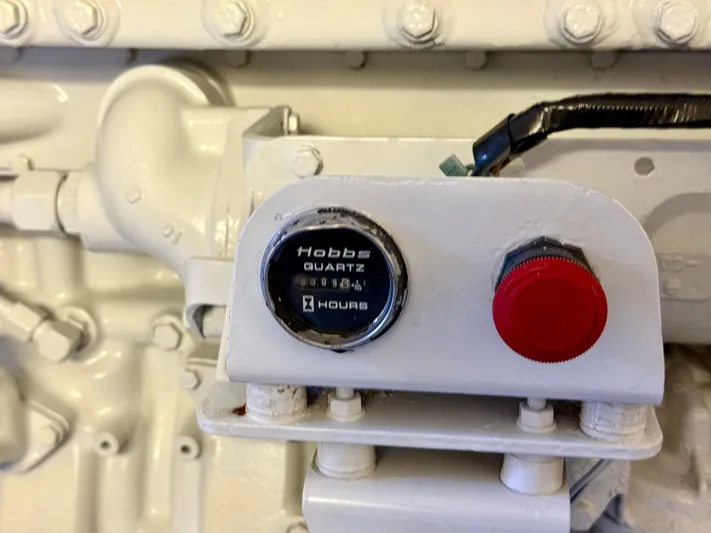 Cavileah Yacht Photos Pics Engine hour meter and red button on 1997 West Bay Sonship 58 Pilothouse.