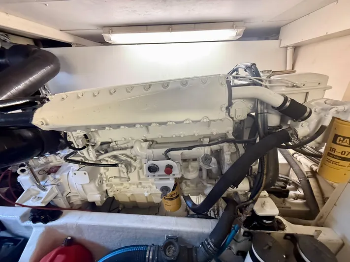 Cavileah Yacht Photos Pics Engine room of 1997 West Bay Sonship 58 Pilothouse, showcasing a well-maintained marine engine.