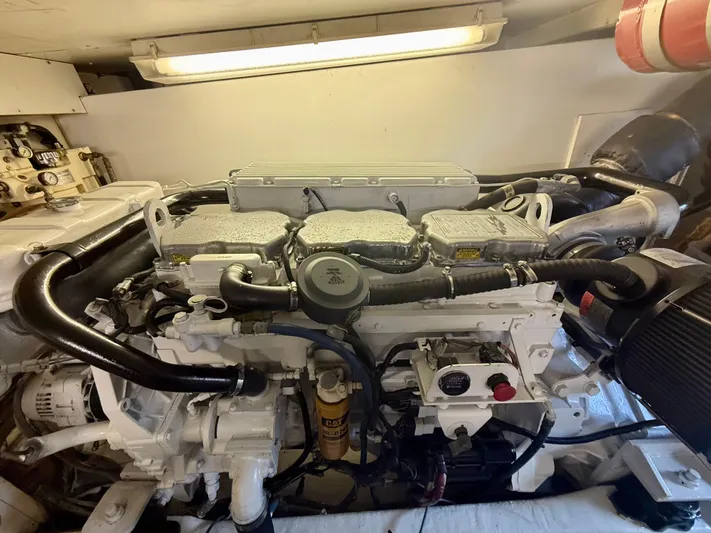 Cavileah Yacht Photos Pics Engine room of 1997 West Bay Sonship 58 Pilothouse yacht, featuring a well-maintained engine.