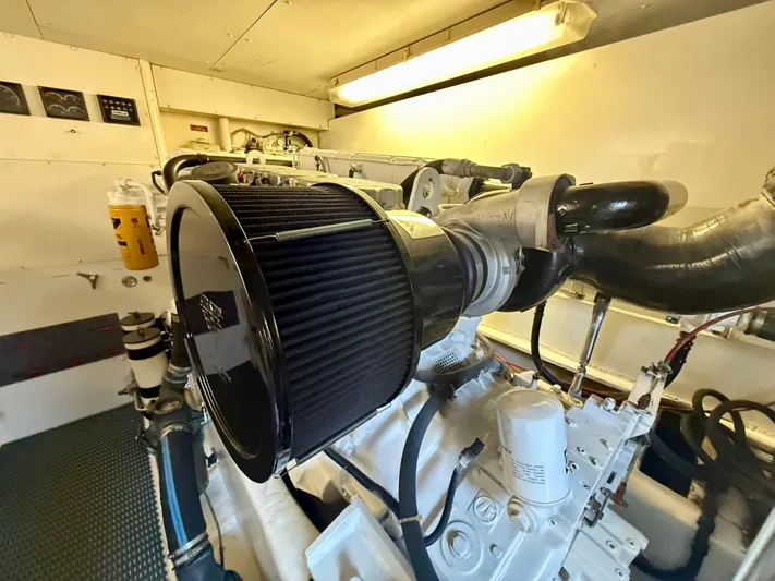 Cavileah Yacht Photos Pics Engine room of 1997 West Bay Sonship 58 Pilothouse, showcasing detailed machinery components.