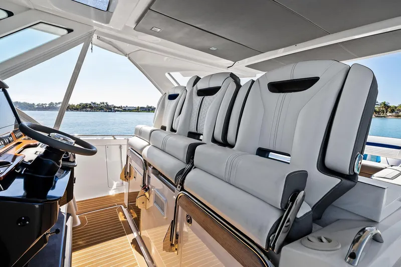 Miss Marie Yacht Photos Pics Luxurious interior of 2019 Tiara Yachts 38 LS with plush seating and sleek design.