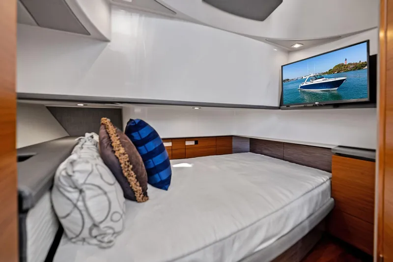 Miss Marie Yacht Photos Pics Luxurious cabin interior of 2019 Tiara Yachts 38 LS with modern decor and TV.