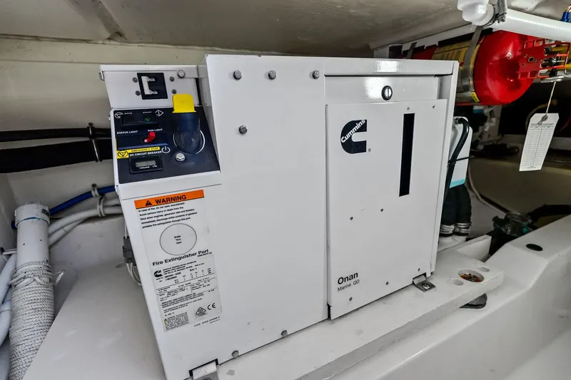 Miss Marie Yacht Photos Pics Cummins Onan Marine QD generator in 2019 Tiara Yachts 38 LS engine room.