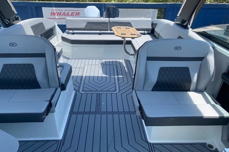 Casa - 2023 Cobalt R33 Ob @ Vallarta Yacht Photos Pics 2023 Cobalt R33 Outboard boat interior with sleek seating and modern design.