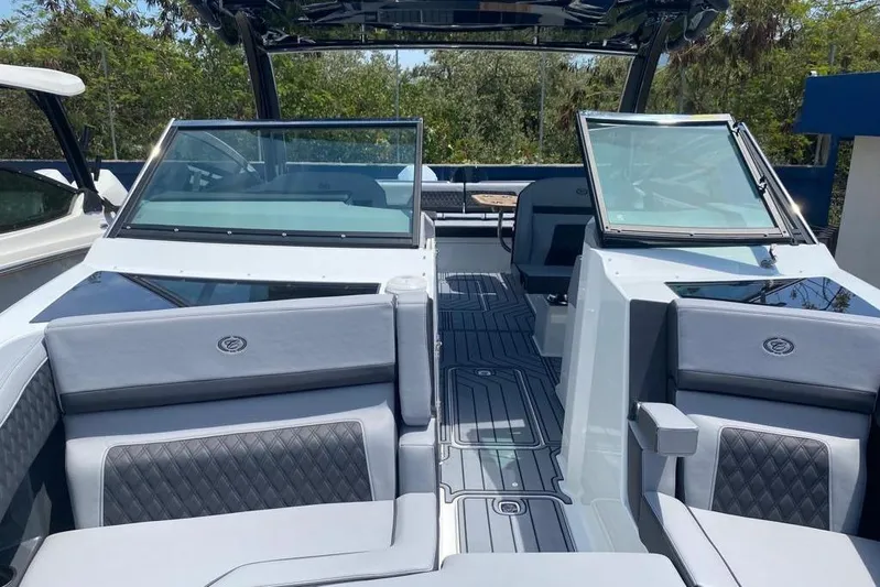 Casa - 2023 Cobalt R33 Ob @ Vallarta Yacht Photos Pics 2023 Cobalt R33 Outboard boat interior with sleek seating and modern design.