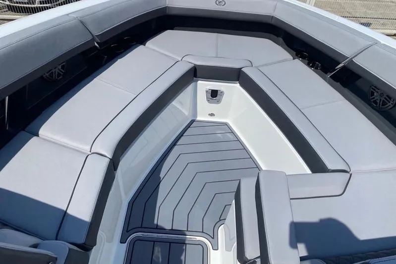 Casa - 2023 Cobalt R33 Ob @ Vallarta Yacht Photos Pics 2023 Cobalt R33 Outboard boat interior with sleek gray seating and modern design.